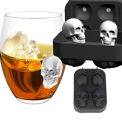 Black silicone ice cube tray with four skull-shaped cavities measuring 12cm long