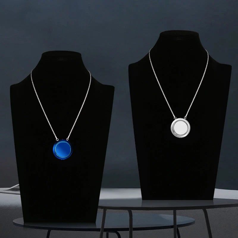 Portable negative ion air purifier necklace in blue, white, and silver options