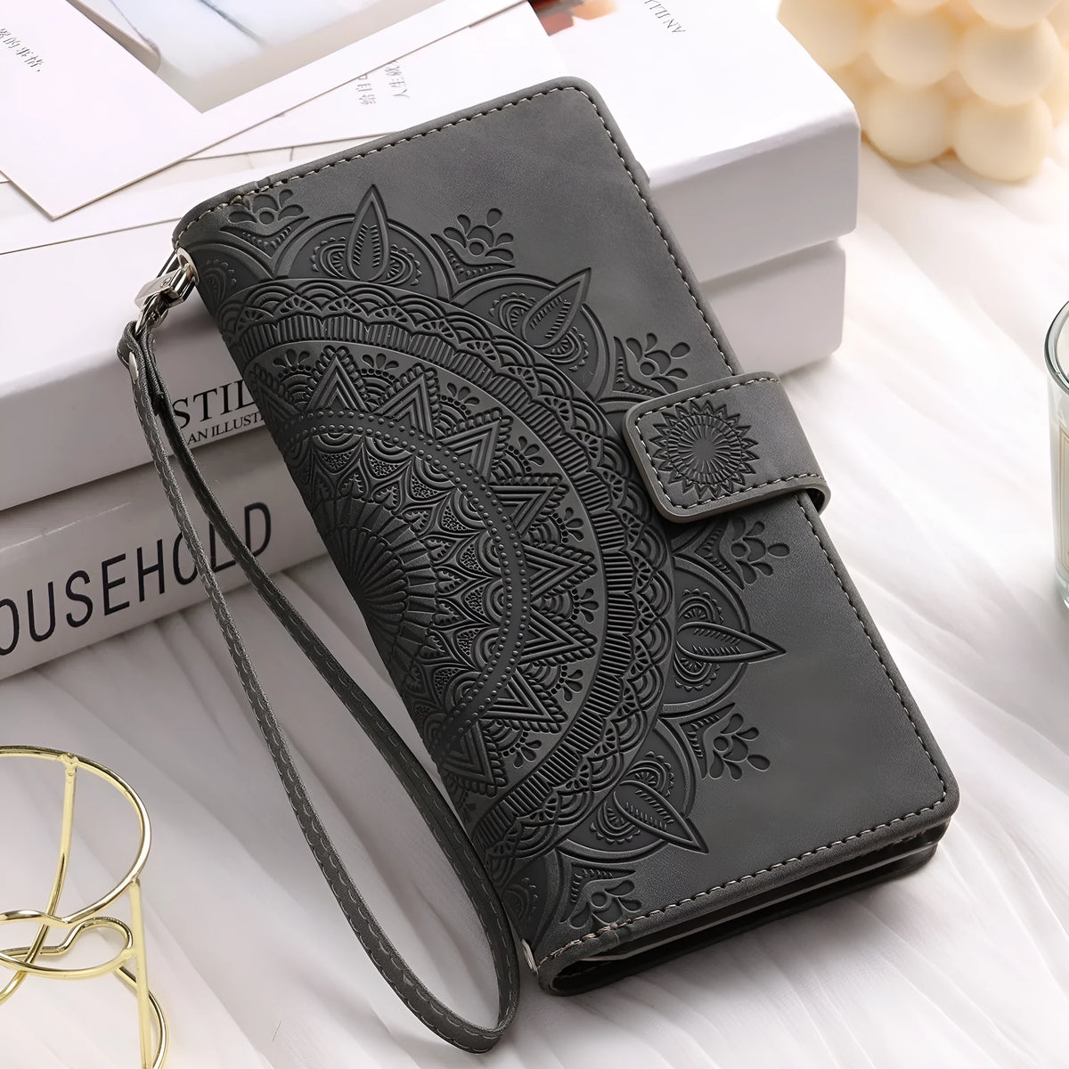 Multi-card embossed totem leather zipper bag phone case for iPhone 16 Pro in black, flip style with card slots