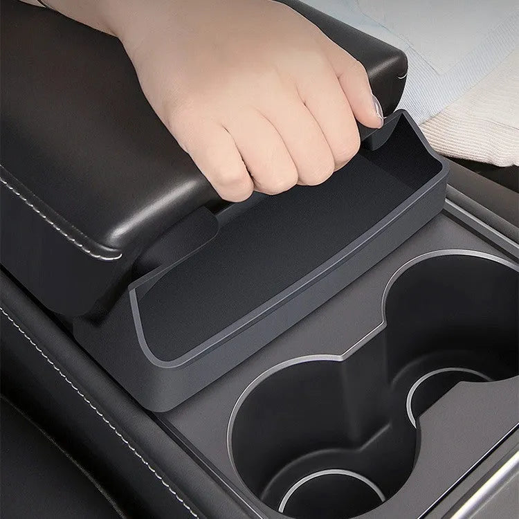 Black silicone glasses case mounted in Tesla Model 3/Y centre console
