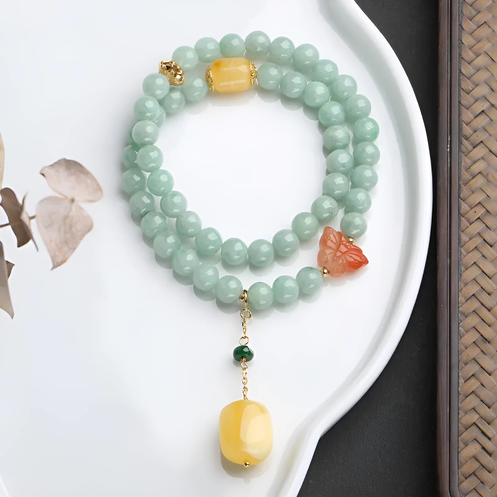 Double-layer women's bracelet with emerald jade round beads and beeswax barrel beads in geometric design