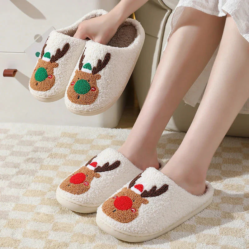 Cozy festive elk-themed slippers in red and green colors, featuring plush, soft materials for comfortable indoor wear