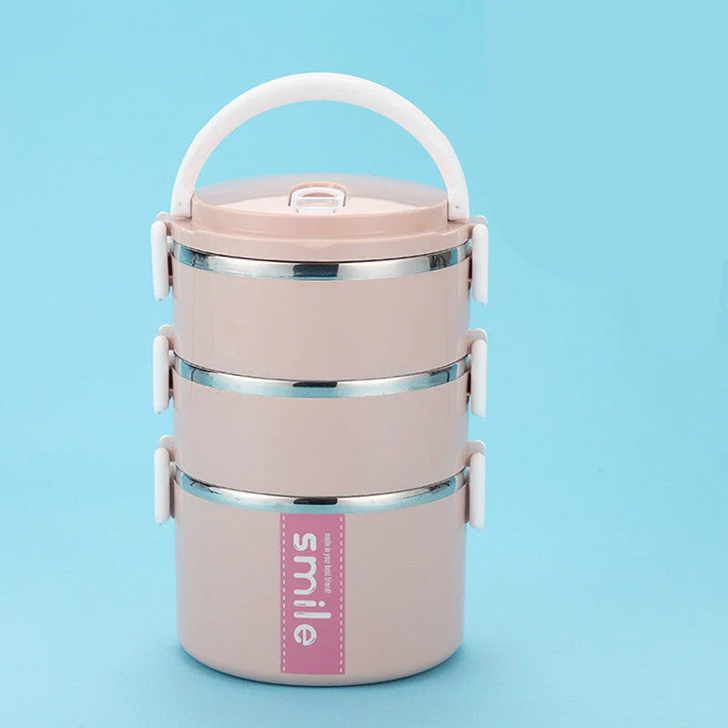 Stainless steel lunch box with built-in spoon, leak-proof design, in green, pink, and blue