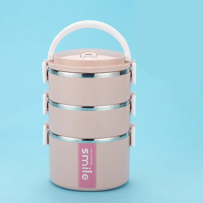 Stainless steel lunch box with built-in spoon, leak-proof design, in green, pink, and blue