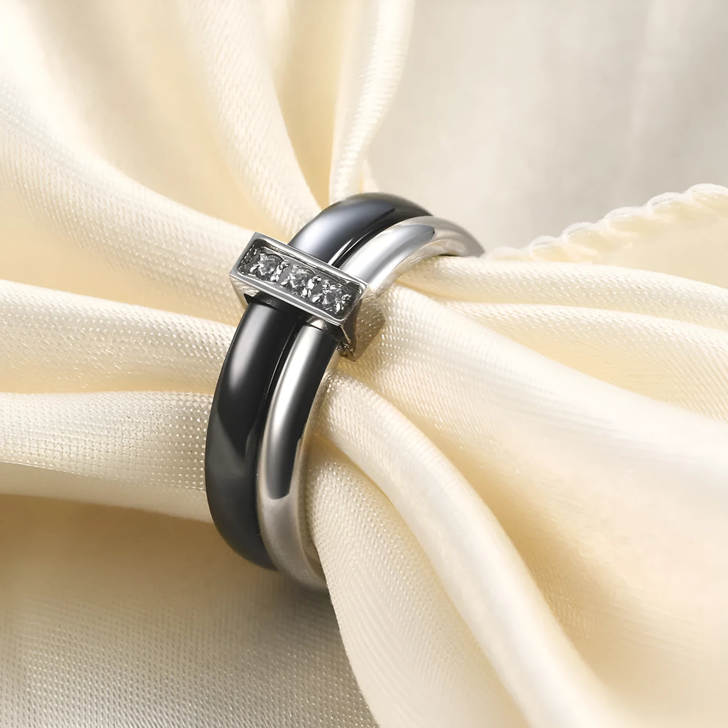 Glossy black ceramic women's ring with a zirconium inlay on a 6mm wide band.