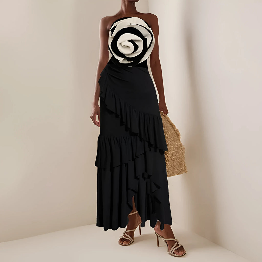 Women's black and white one-piece swimsuit with matching skirt for beach wear
