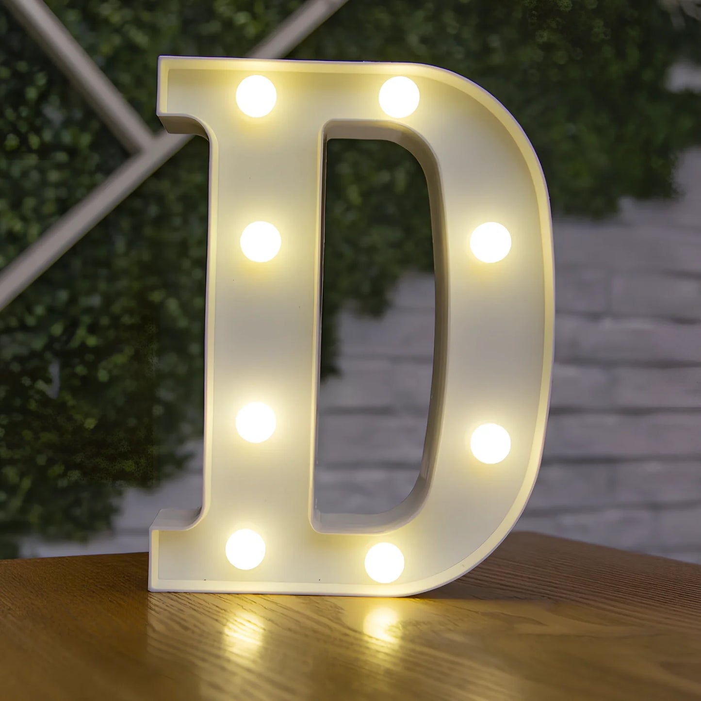 White plastic LED alphabet marquee sign with warm white illumination, 22cm height with battery operation