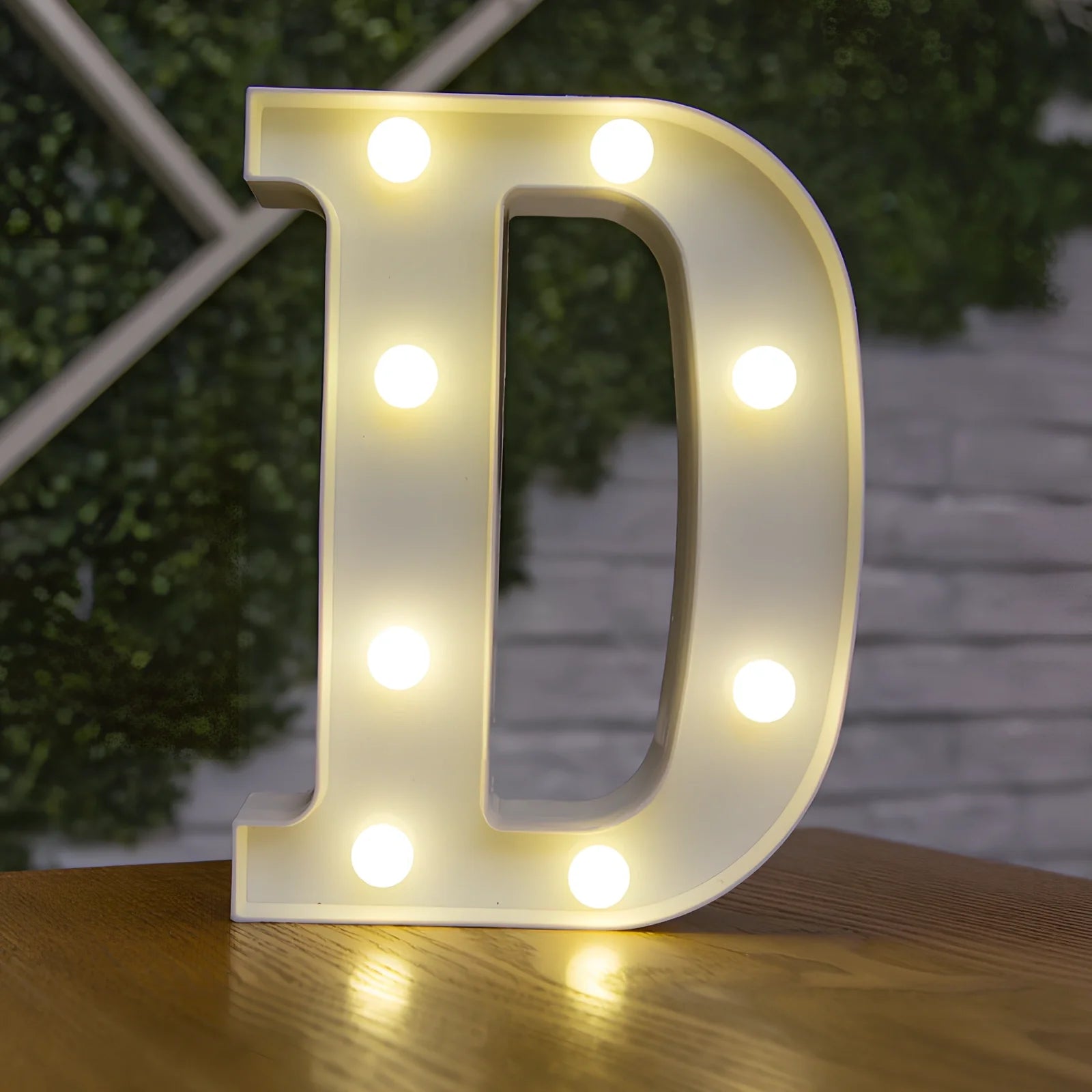 White plastic LED alphabet marquee sign with warm white illumination, 22cm height with battery operation