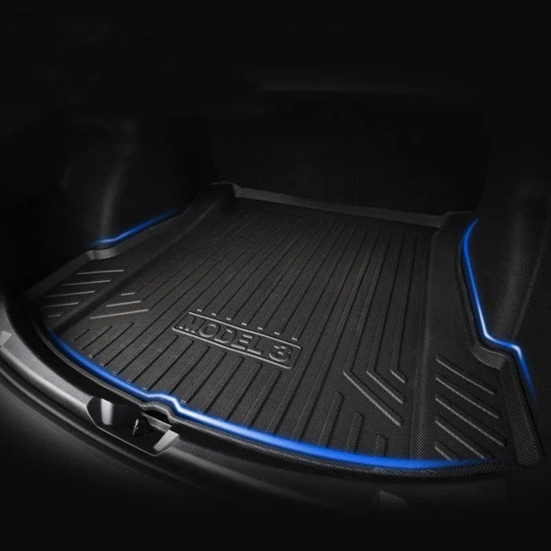 Rubber floor mat for Tesla car with TPE footrest section.
