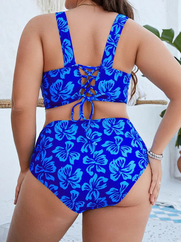 Blue floral print plus size women's split bikini swimsuit on hanger