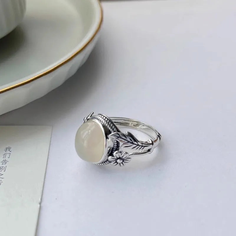 Copper adjustable vintage ring with imitation white chalcedony stone and antiqued finish