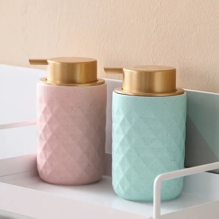 Large pump head facial cleanser foam dispenser in metallic finish