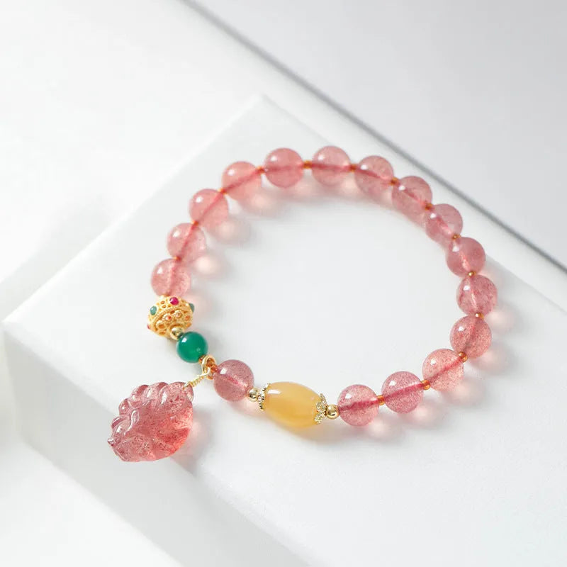 Women's strawberry quartz crystal beaded bracelet with magnetic clasp in a Nine Tail Fox design.