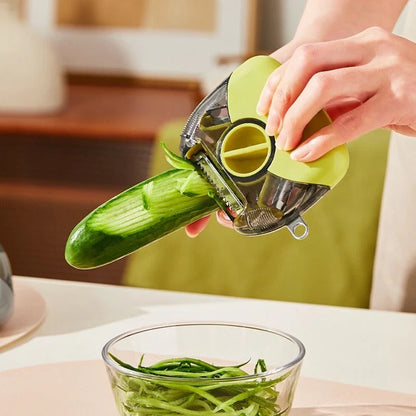 3-in-1 stainless steel peeler shredder with green and gray options for versatile kitchen tasks