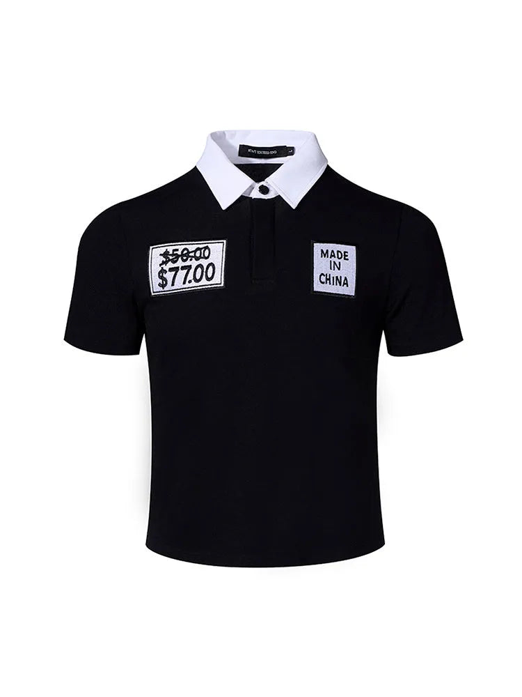 Black slim fit men's polo shirt with embroidery detail on the chest, featuring short sleeves and a polo collar.