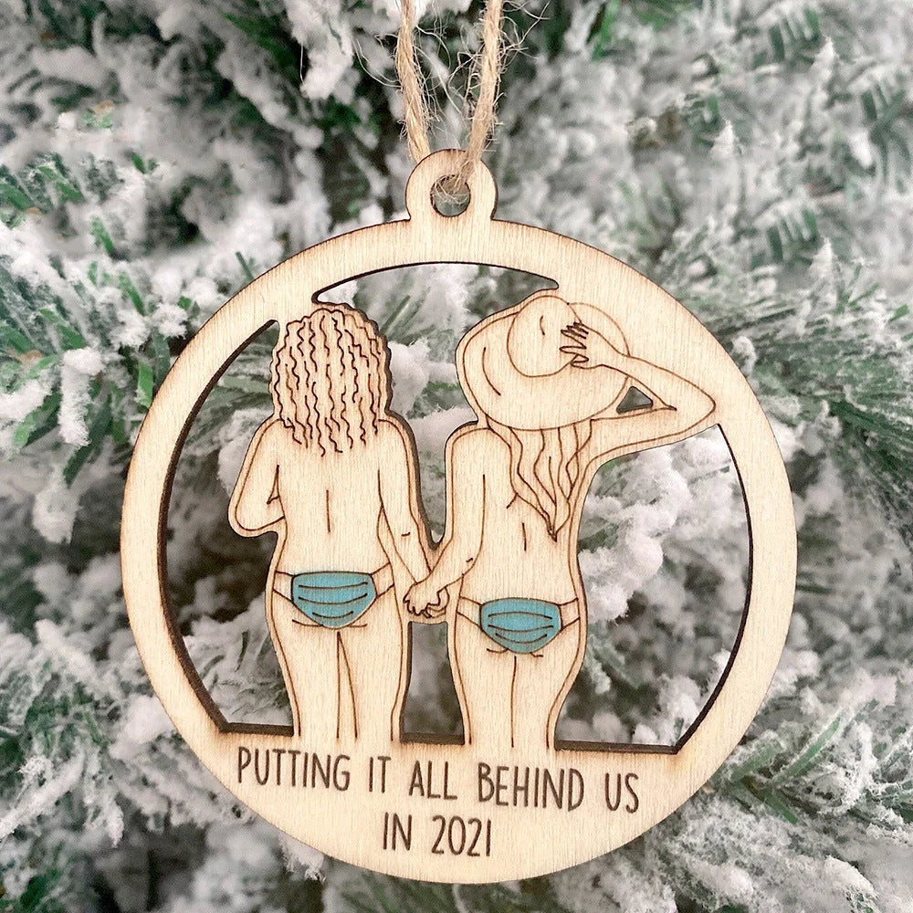 Wooden Christmas tree pendant with snowman and deer laser-cut design