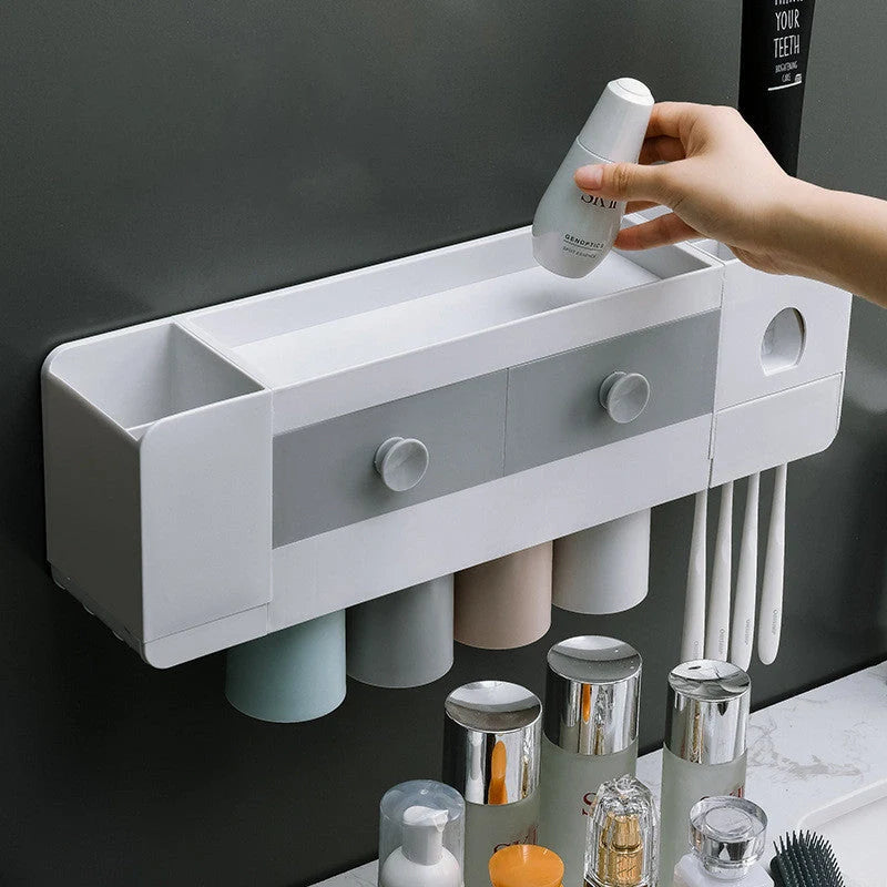 Wall-mounted magnetic toothbrush rack with automatic toothpaste dispenser in white plastic