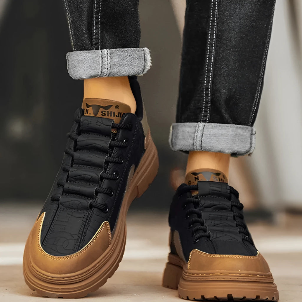 Black and white platform sneakers with thick rubber soles and microfiber leather insoles
