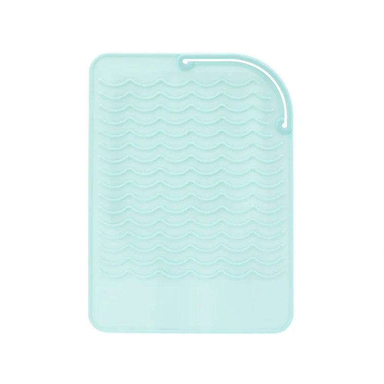 Silicone heat-proof mat for hair styling tools in pink, green, dark blue, or grey