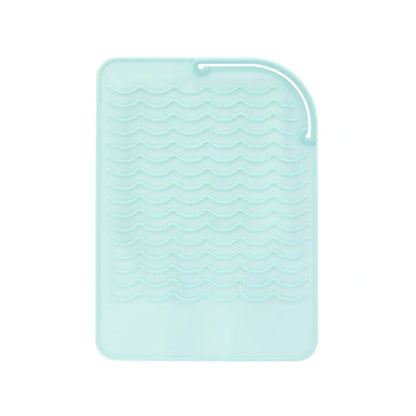 Silicone heat-proof mat for hair styling tools in pink, green, dark blue, or grey