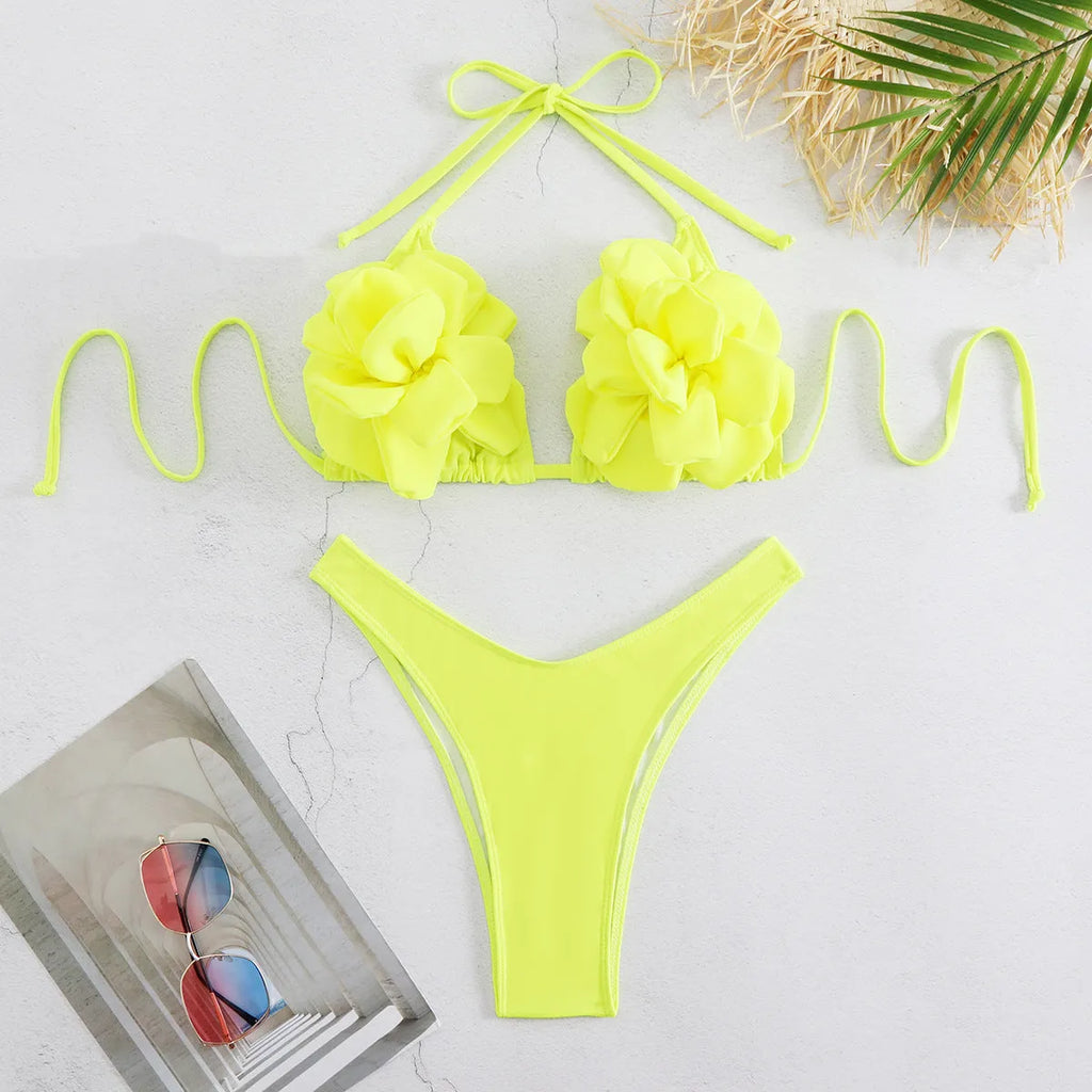 Low waist bikini swimsuit with 3D flower design in solid colour