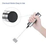Handheld electric milk frother and blender in silver, with detachable whisk head