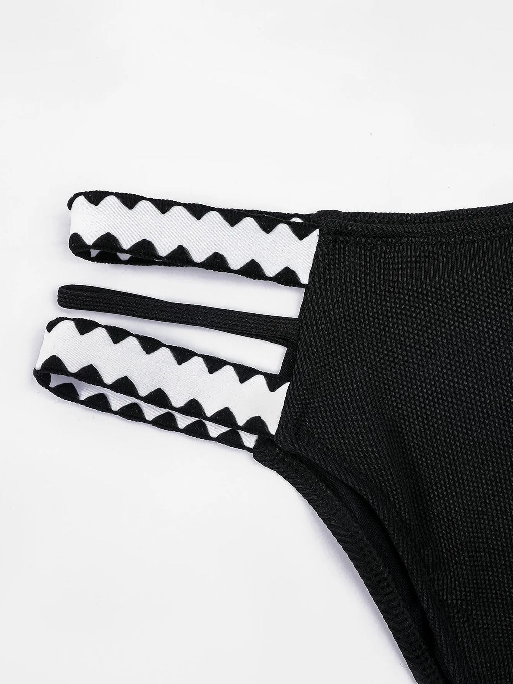 Black women's hollowed-out split swimsuit bikini set with cut-out design detail