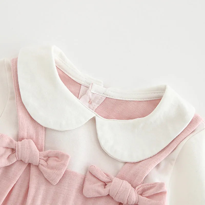 Pink cotton baby jumpsuit with embroidery and long sleeves for girls
