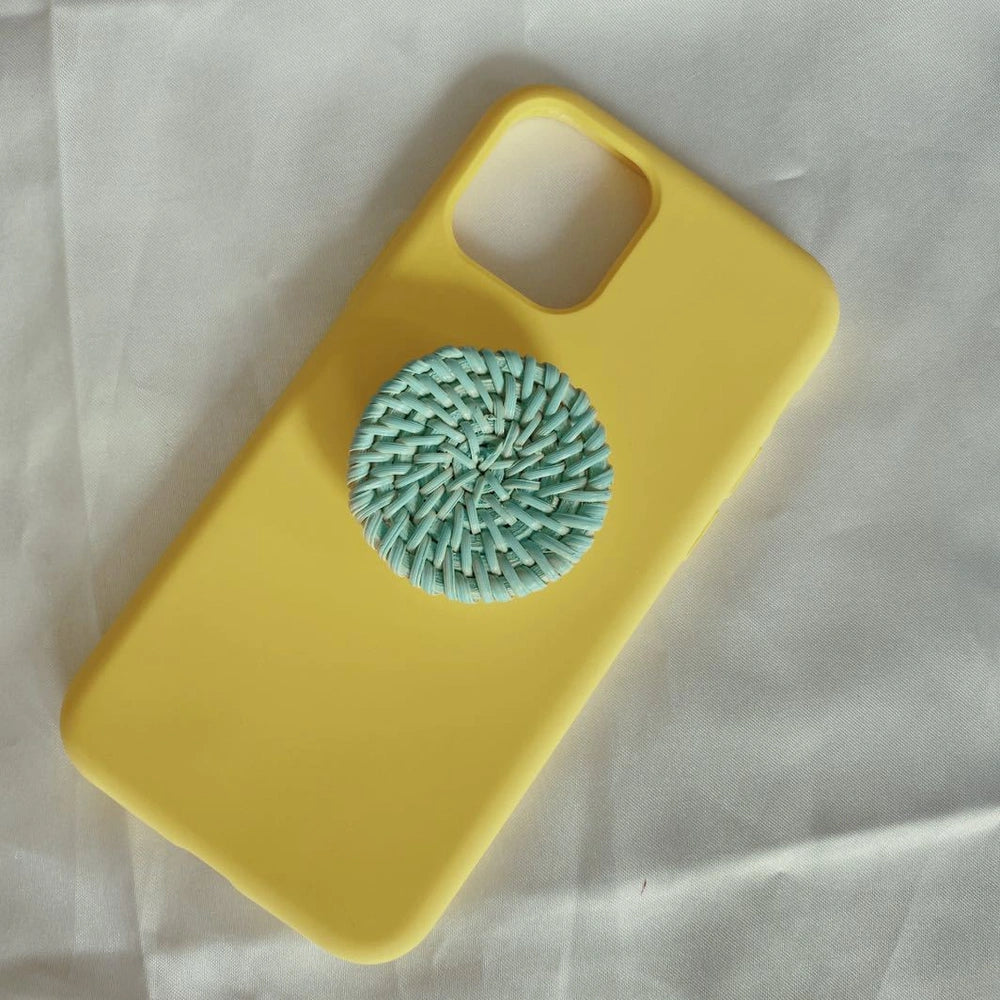 Bamboo woven telescopic phone stand extended to 25cm height holding smartphone