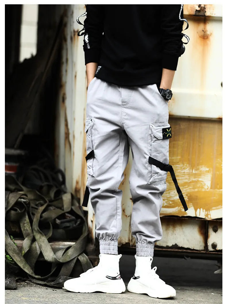 Men's casual cotton cargo pants in black with multiple pockets, available in Asian sizes S to XL