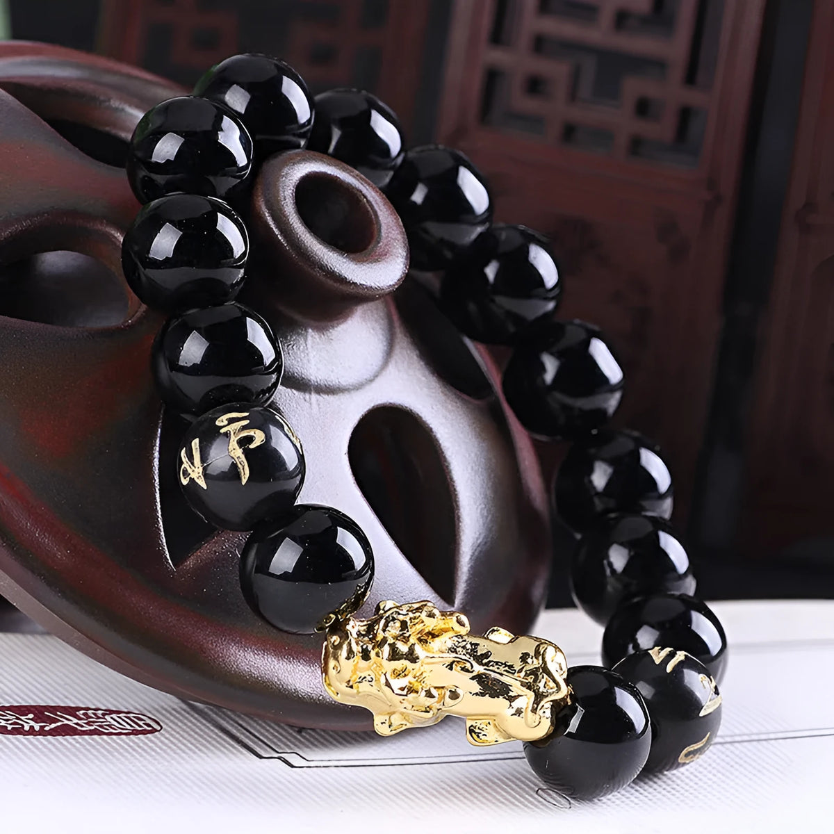Imitation obsidian 18K gold-tone bracelet with six brave words engraving and little pearl accent