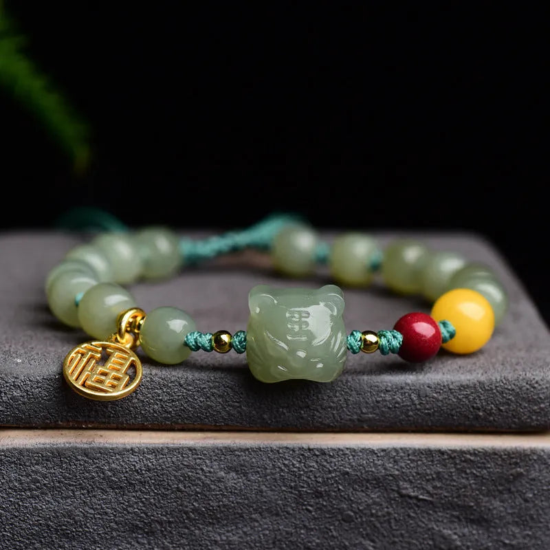 Natural Hetian Jade bracelet with cinnabar beads, beeswax elements and animal zodiac modelling