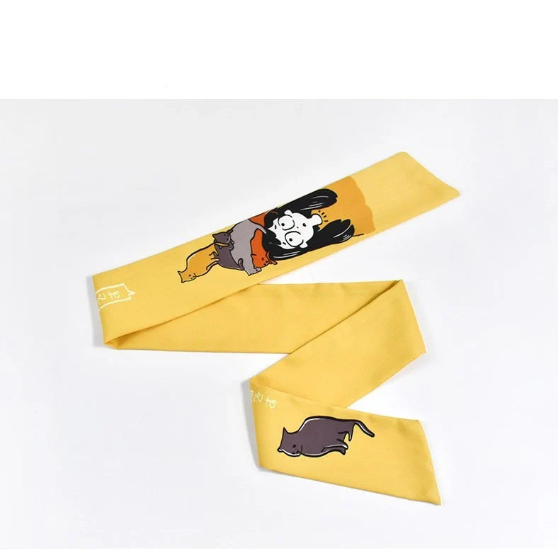 Blue and yellow cloth cat hair band with original tiara design measuring 3cm wide