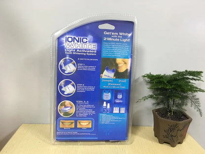 Cold light teeth whitening device with medical polymer construction for stain removal