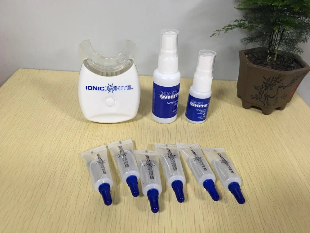 Cold light teeth whitening device with medical polymer construction for stain removal