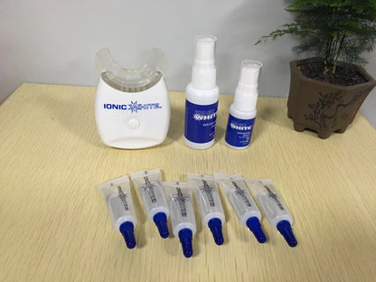 Cold light teeth whitening device with medical polymer construction for stain removal