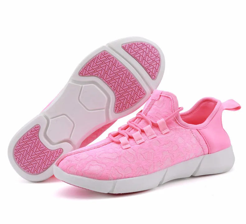 Casual loafers for men and women with fly woven upper, flat heel, and luminous accents in white colour option