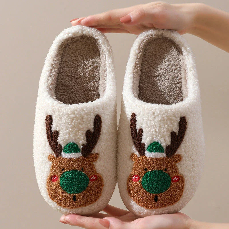 Cozy festive elk-themed slippers in red and green colors, featuring plush, soft materials for comfortable indoor wear