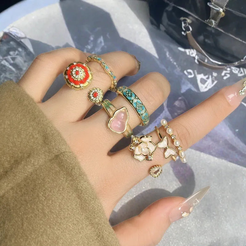 Adjustable copper ring with a vintage gourd, flower, and bow design in a new Chinese style.