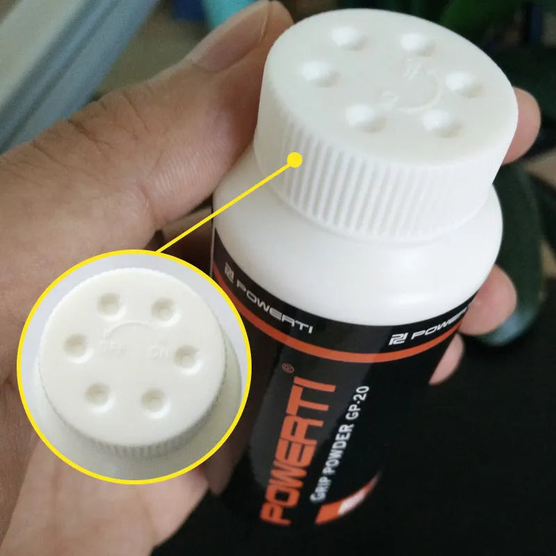 White magnesium carbonate sports anti-slip powder in container for badminton and weightlifting grip.