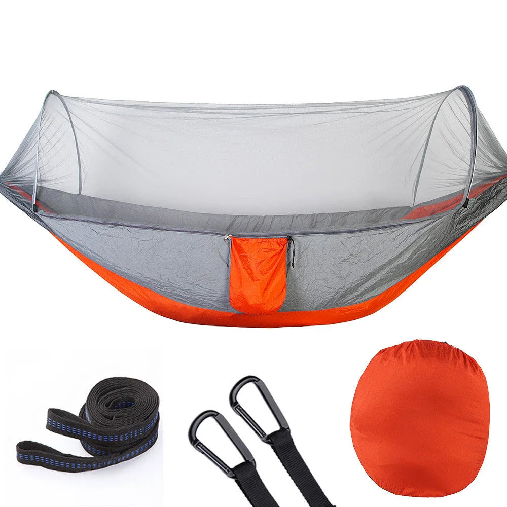 Cozy outdoor hammock with quick pop-up mosquito net, perfect for camping, hiking, and backyard relaxation