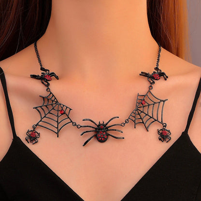 A close-up of a necklace featuring an intricate spider web design, made of high-quality alloy with a polished finish.