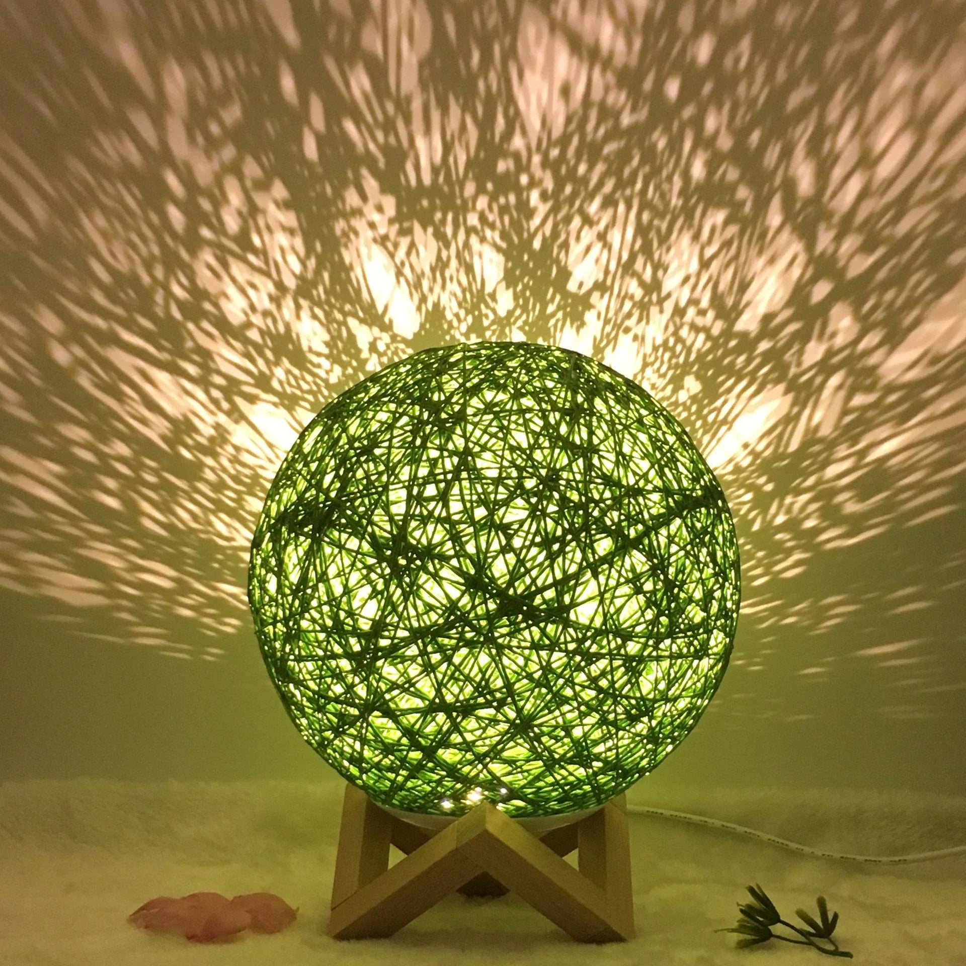 LED rattan table lamp with hand-knit lampshade in various colours