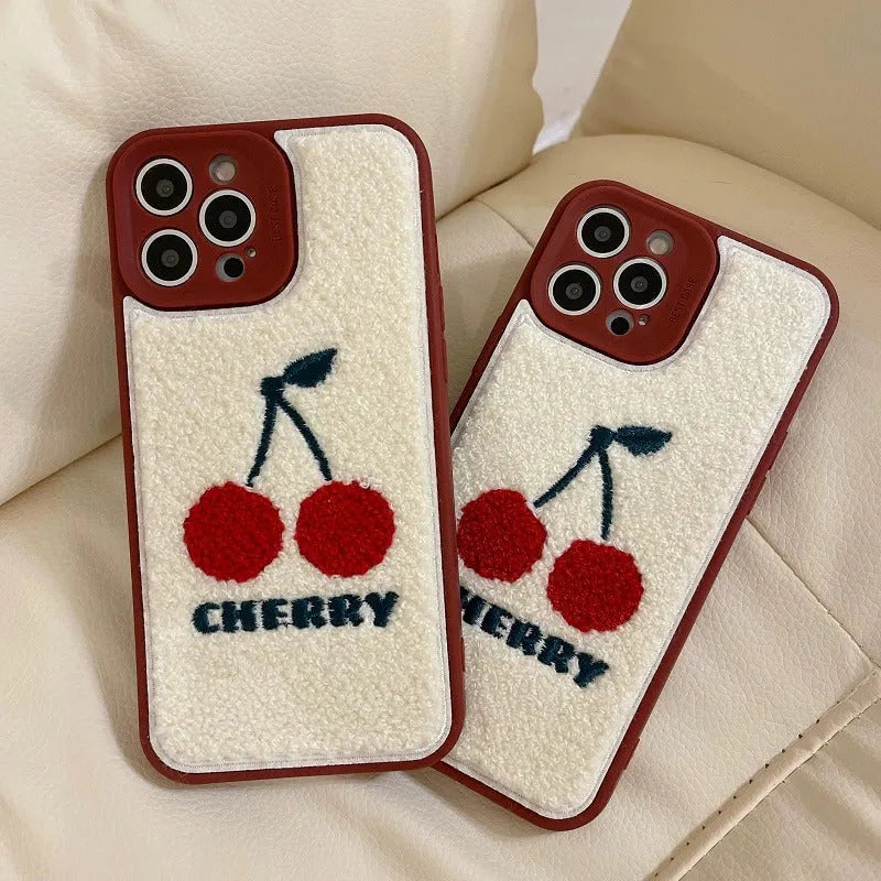 Red plush full lens phone case with cherry design for iPhone showing camera module coverage
