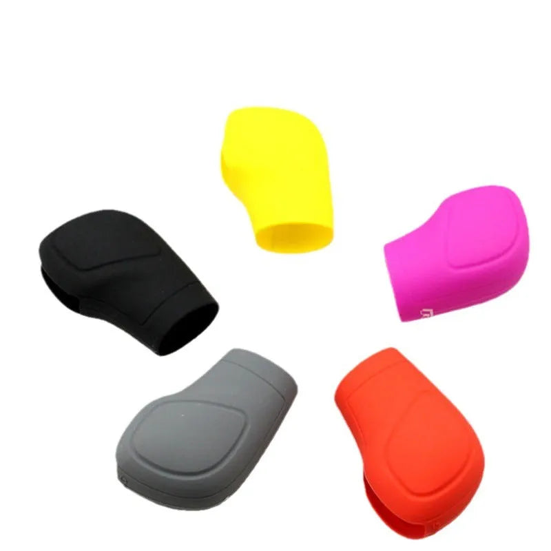 Universal silicone gear wave sleeve for automatic car gear stick, black colour, close-up on gear lever