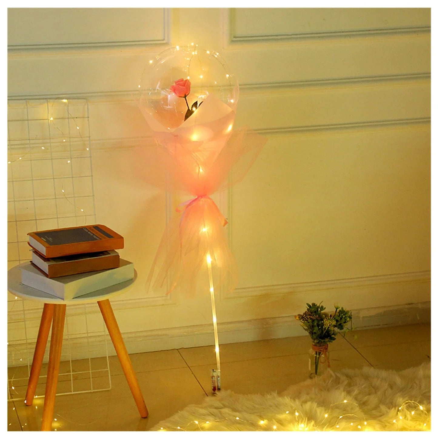 A captivating bouquet of LED-lit balloons and rose blooms, creating a mesmerizing ambiance for any celebration.