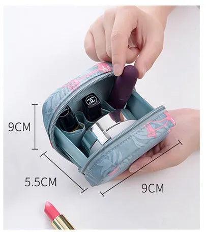 Cube-shaped plain cloth makeup storage bag in blue, pink, white, or white pink.