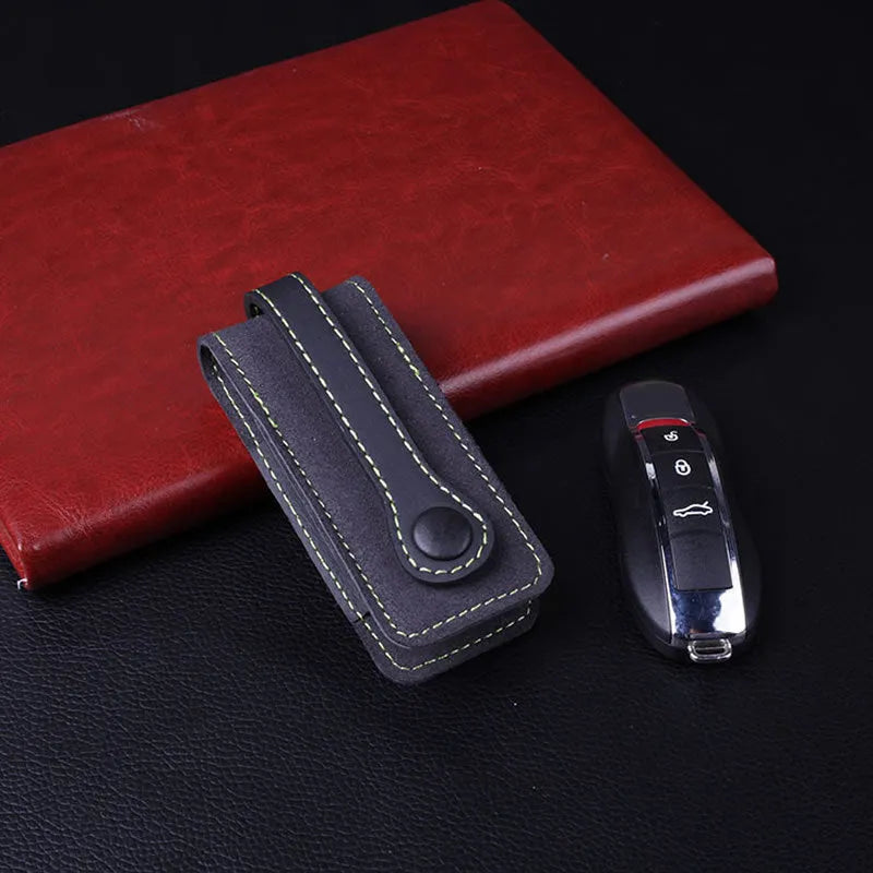 Cow leather key case for Porsche with belt buckle closure in black colour