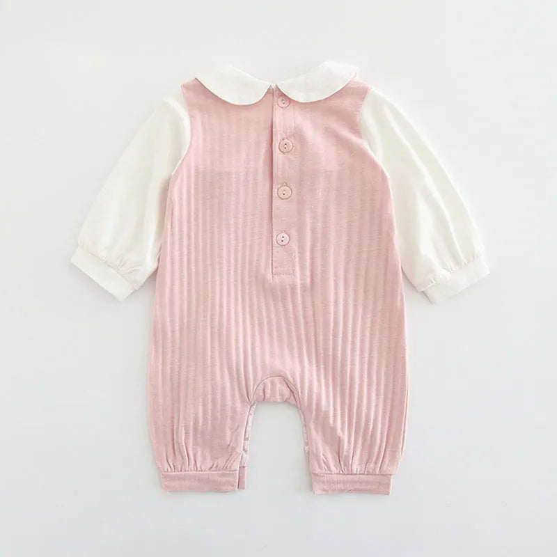 Pink cotton baby jumpsuit with embroidery and long sleeves for girls
