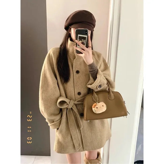 Korean style casual short woolen coat in black with button closure and conventional sleeves